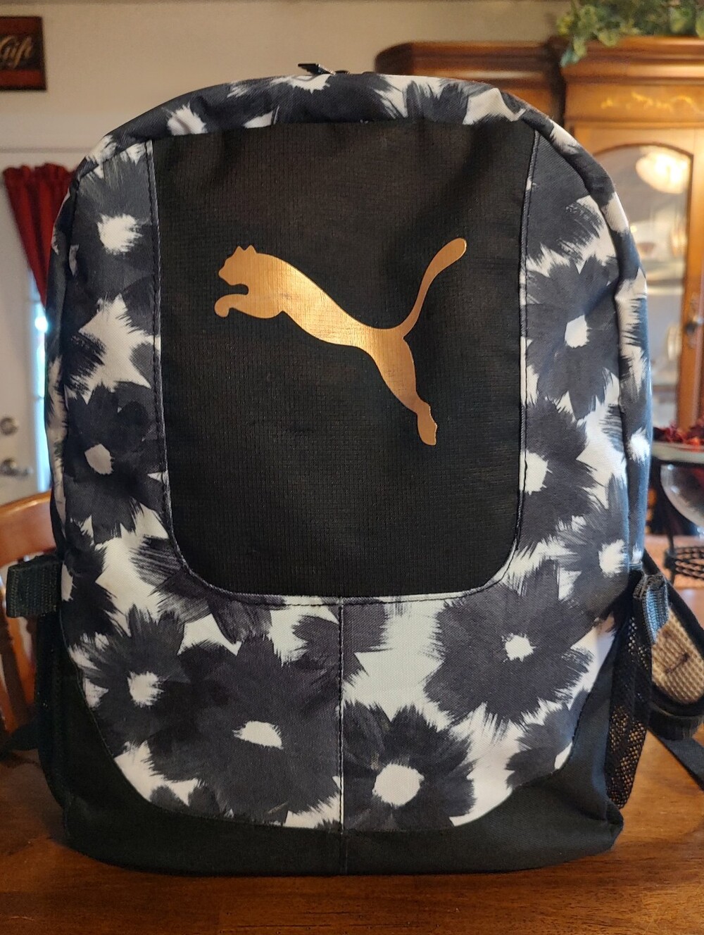 Puma Black & White Floral Backpack with Gold Logo And Pink Accents